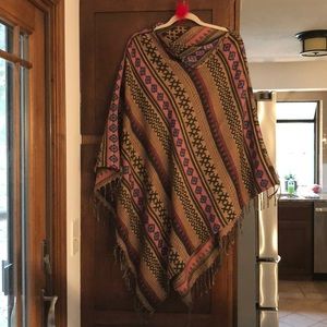 Poncho. Rose/tan/brown/blue